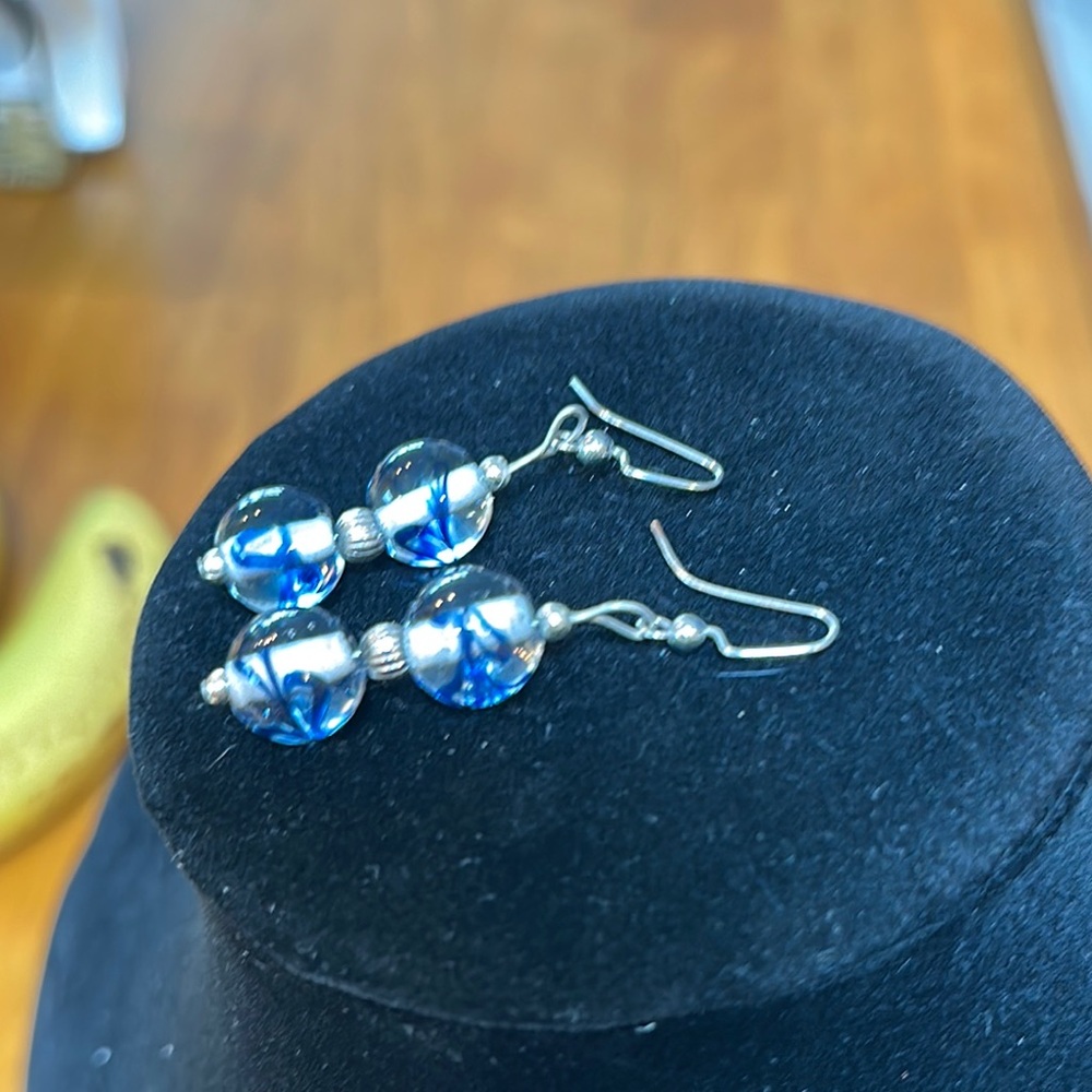 Silvertone, blue swirl and clear circle bead earrings. Looks great with denim